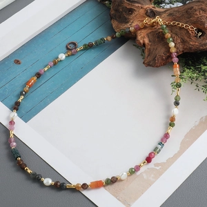 Handmade necklace with natural tourmaline beads, freshwater pearls and gold metal accents