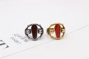 Gothic coffin rings in vintage silver and gold with red enamel and skull detailing