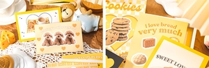Close-up of vintage yellow postcards featuring cute dog illustrations and bread themes