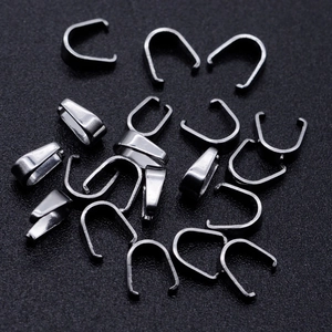 Bulk silver-colored stainless steel bail clasps for DIY jewelry making on dark background
