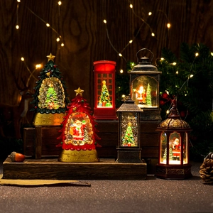 Christmas LED lantern set with festive snowman and Santa scenes in vintage red and gold