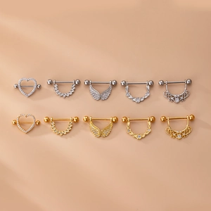 Zirconia inlaid heart and wing stainless steel nipple rings in gold and silver set
