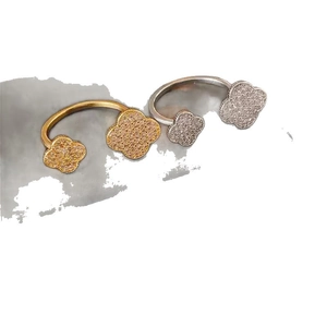 Elegant gold and silver four-leaf clover rings with sparkling zircon inlay for women