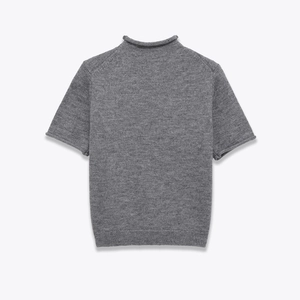 Detail of grey short sleeve knit top showing the soft rolled mock neck and fabric texture