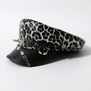 Punk leopard print beret with black leather brim and silver metallic rivets and spikes