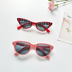 Retro black and white striped cat eye sunglasses for women with red pattern frames