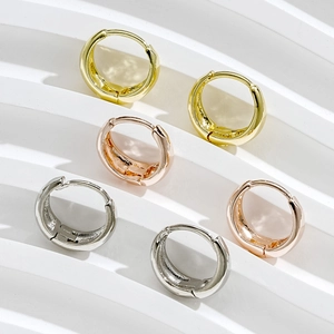 Three-pair geometric C-shaped earring set in gold, rose gold, and silver finishes