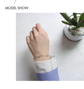 Minimalist S925 sterling silver double-layer snake chain bracelet with beads on wrist