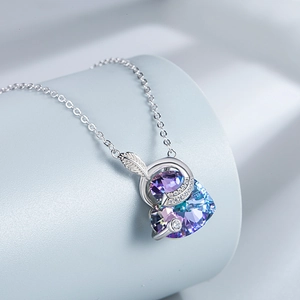 S925 Sterling silver necklace featuring gradient crystal heart and silver feather pendant