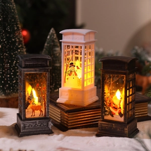 Three vintage Christmas telephone booth lanterns in white, black, and bronze with LED light