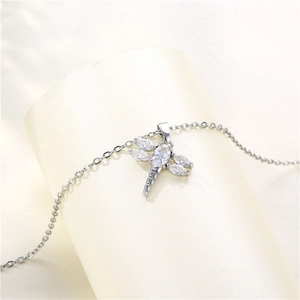 Silver titanium steel dragonfly necklace with clear cubic zirconia on minimalist stand