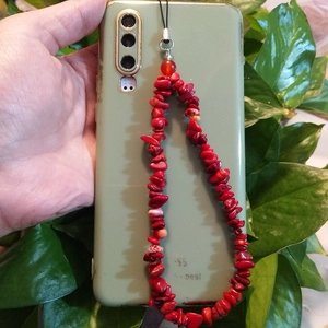 Ethnic style phone strap with irregular red crushed stones and durable black lanyard cord