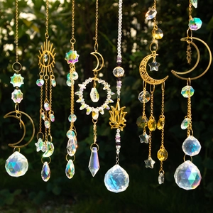Golden crystal suncatcher with moon, star and lotus pendants for garden window decor
