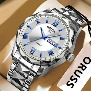 Macro detail of quartz watch featuring blue Roman numerals and faceted stainless steel strap