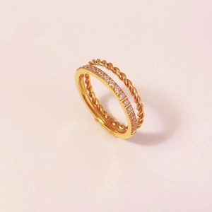 Double-layer gold stainless steel ring featuring twisted rope design and sparkling CZ stones