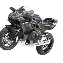 Detailed close-up of a black and green sport motorcycle model with Ninja branding