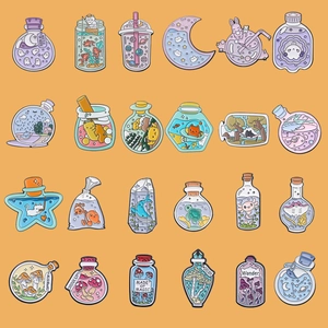 Collection of creative enamel pins featuring whimsical glass bottles and magic themes