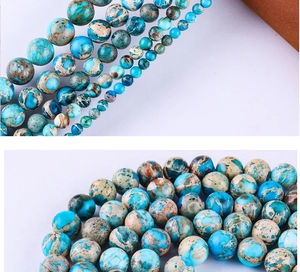 Detail of blue and brown emperor stone round beads for DIY jewelry making