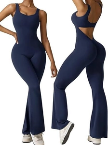 Detail of dark blue backless yoga jumpsuit with wide leg and high elastic fabric