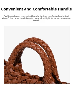 Detailed close-up of the thick woven leather handle on a caramel brown luxury tote bag