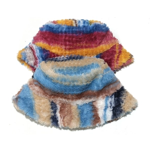 Detail of colorful striped plush bucket hats showing soft faux fur texture and vibrant gradients