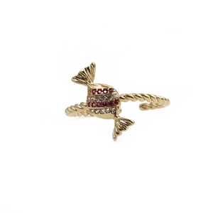 Golden candy-shaped open ring with red and white zircons on a twisted band