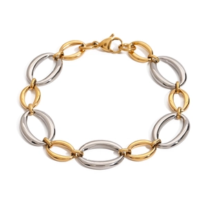 Two-tone gold and silver stainless steel chain bracelet with lobster clasp on white background