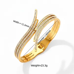 Polished gold multi-layer bypass open bangle with pavé crystals and 12.3mm width