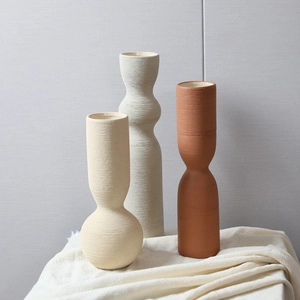 Modern Nordic ceramic vases set with striped texture in cream, grey, and terracotta tones