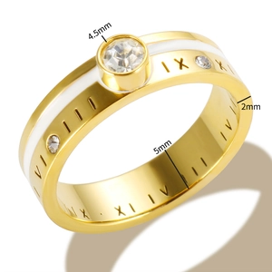 Titanium steel ring with Roman numerals and diamond-set golden finish on white background