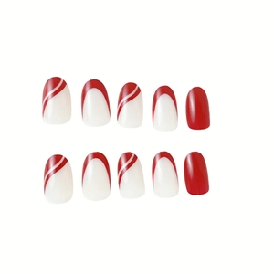 Faux ongles ovales courts avec pointes French rouges et motifs de lignes blanches