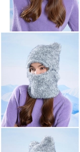 Detailed view of grey faux fur hood scarf with thick plush texture for winter outdoor use