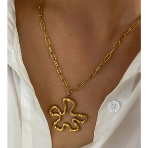 Statement gold floral abstract petal pendant necklace in polished titanium steel for women