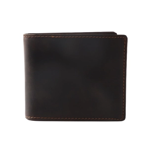 Close-up of deep brown crazy horse leather wallet with contrast stitching detail