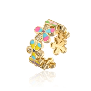 Irregular gold flower ring with colorful enamel petals and zircon crystal accents
