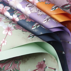 Premium waterproof floral wrapping paper with elegant cherry blossom prints in varied colors