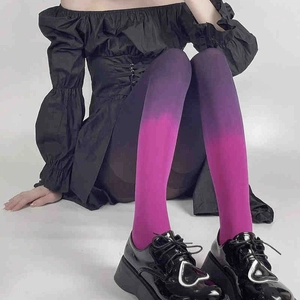 Sexy purple to pink gradient velvet pantyhose tights shown in a professional sitting pose