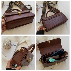 Brown leather crossbody bag with vintage bohemian strap and internal storage detail