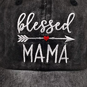 Macro shot of Blessed Mama embroidery details on a washed gray cotton baseball cap