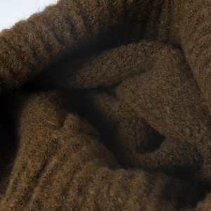 Deep brown thick knit beanie for men and women featuring warm ribbed texture and cozy wool material