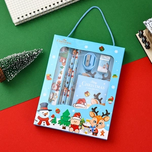 Christmas stationery gift set with 6 pieces including pencils and notebook in a blue box.
