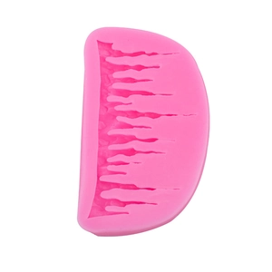 Pink silicone fondant mold with icicle drip pattern for Christmas cake decorating