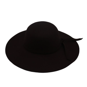 Detailed view of the wave-shaped wide brim on this elegant black wool felt floppy hat
