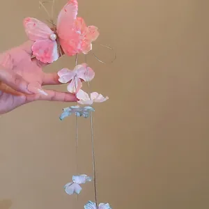 Pink and blue butterfly hair clip with silk fabric wings, pearls and long chain tassels