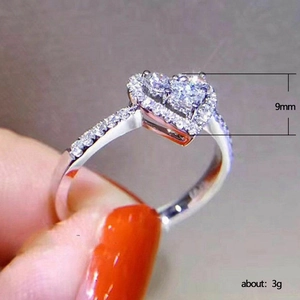 Sparkling heart shaped zircon ring in silver finish with 9mm wide pave setting stone