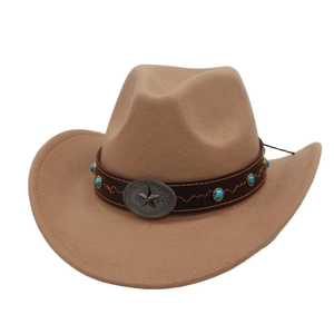Detail of western cowboy hat with brown leather band and silver star metal buckle decoration