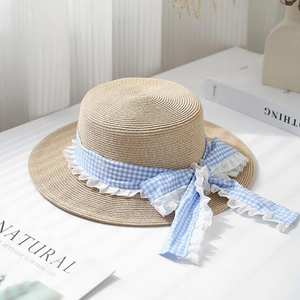 Summer flat top straw hat for women featuring a blue plaid ribbon and lace bow decoration
