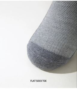Detail view of diabetic socks showing grey mesh fabric and flat seamless toe seam