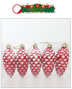 Detail of red pine cone Christmas ornaments with snow glitter and gold hanging string