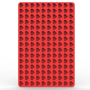 Macro shot of red rectangular silicone mold with multiple heart-shaped cavities for candy